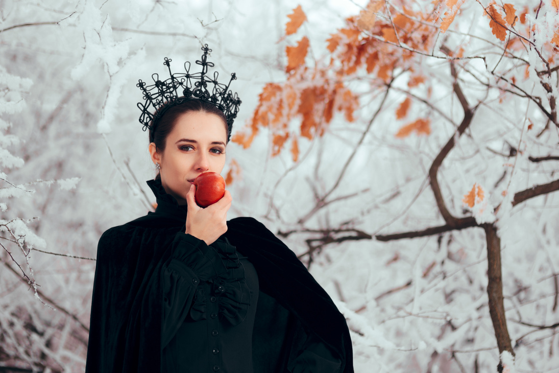 Evil Queen with Poisoned Apple in Winter Wonderland